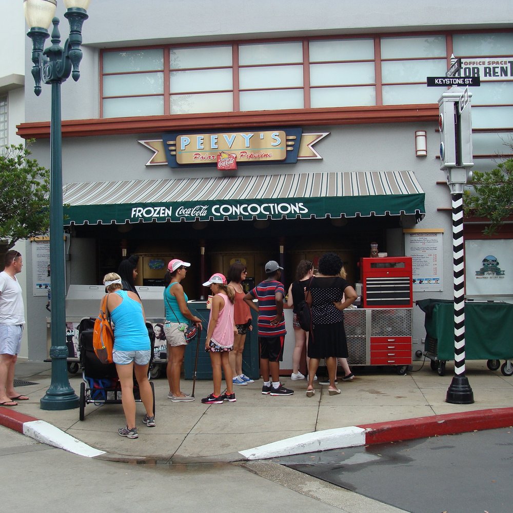 Peevy's Frozen Concoctions - a group of people standing in front of a store - Ice Cream & Frozen Yogurt Near Me - Kissimmee, Florida Peevy's Frozen Concoctions - a group of people standing in front of a store - Ice Cream & Frozen Yogurt Near Me - Kissimmee, Florida
