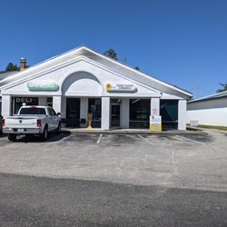 Totally Covered - The Store front view from the road. (more parking in the back)