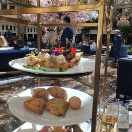 3 tier stand with assorted pastries & sandwiches 3 tier stand with assorted pastries & sandwiches
