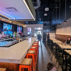 Bloom Bawarchi - Dark and neon atmosphere in main dining area
