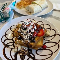 Tom Jones Family Restaurant - Stuffed French Toast with Nutella Breakfast Board Specials Egg Guacamole Burrito Breakfast Board Specials