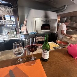 Pizzeria Mamma Mia - Sitting at the bar gives you a great view.