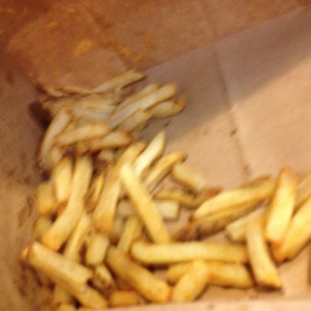 Five Guys - These are the fries that spilled over in our bag. Large was tremendous! - Burgers Near Me - Levittown, New York