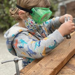 Explorer Preschool - Learning to work with a hammer and nails