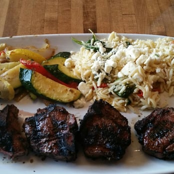 Acropolis Greek Taverna - Delicious lamb chops with spinach orzo and roasted vegetables.  Very tasty! - Greek Near Me - Riverview, Florida