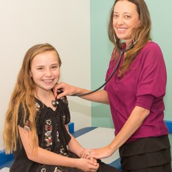 Children's Primary Care Medical Group - Dr. Elizabeth Burgamy with a patient.