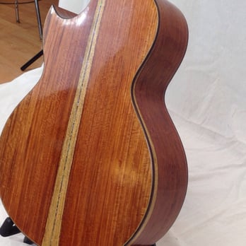 Fretted Strings - Rear of Sangho's first guitar. Asian Rosewood with blue abalone backstrip. Finished with French polish. - Musical Instruments & Teachers Near Me - Davis, California