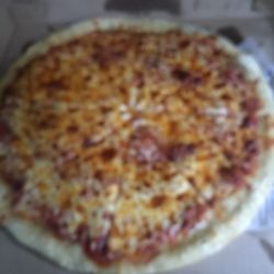 Emeralds II - Plain cheese thin crust pizza.