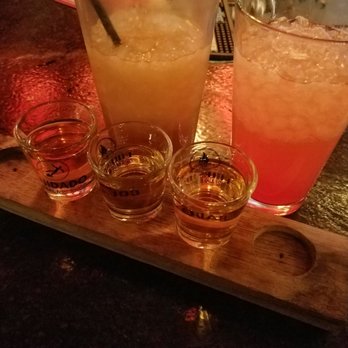 Mile High Spirits - Top to bottom, left to right: caramel float, BlackBerry mist. Flight: chocolate doughnut bourbon, peach whiskey, aged rum. - Distilleries Near Me - Denver, Colorado