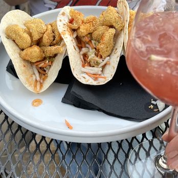 Under the Moon Cafe - An image of fried cod tacos and a glass of red sangria. - Tapas/Small Plates Near Me - Lambertville, New Jersey Under the Moon Cafe - An image of fried cod tacos and a glass of red sangria. - Tapas/Small Plates Near Me - Lambertville, New Jersey