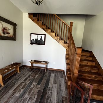 Flippin Floors Plus - a staircase leading to a second floor - Flooring Near Me - Granbury, Texas Flippin Floors Plus - a staircase leading to a second floor - Flooring Near Me - Granbury, Texas