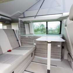 Southampton Campers VW Camper Van Hire - Kitchen table extended for meal time or board games!