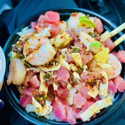 Tokyo Joe's - Ahi Poke bowl added Shrimp, scoop of crab, avocado, pineapple, wontons and their spicy Hawaiian sauce with a spicy aioli on the side