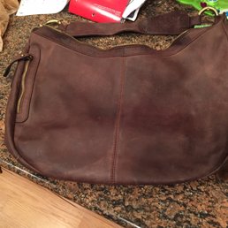 Look at the top corners & bottom middle to see the color. You can clearly see the VERY LARGE dark brown"stain"they caused.