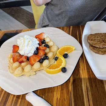 Toast 101 - Classic Waffle $7.00 side sausage $2.00 and eggs$2.00 (forgot the pic of eggs). - Breakfast & Brunch Near Me - Tucson, Arizona Toast 101 - Classic Waffle $7.00 side sausage $2.00 and eggs$2.00 (forgot the pic of eggs). - Breakfast & Brunch Near Me - Tucson, Arizona