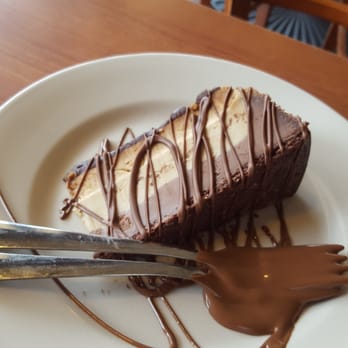 Chocolate Cafe - Espresso cheesecake with chocolate drizzle. Drizzle was a bit much. - Chocolatiers & Shops Near Me - Saint Joseph, Michigan Chocolate Cafe - Espresso cheesecake with chocolate drizzle. Drizzle was a bit much. - Chocolatiers & Shops Near Me - Saint Joseph, Michigan