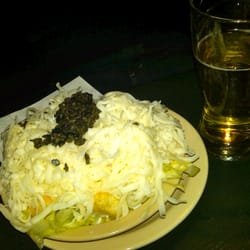 Hello scrumptious cheese salad and beer.