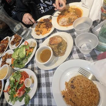 Casa Adela - Full Table!  Ensalada de Aguacate 1/2 Pollo Pollo Guisada Mofongo Maduros Arroz Blanco, Amarillo, or Gandules Habichuelas - Latin American Near Me - New York, New York