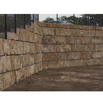 Anderson Landscape - Retaining Wall with fencing by Anderson Landscape - Landscaping Near Me - Austin, Texas