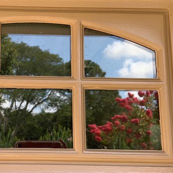 Pease Painting - Garage door windows all have one messy coat. - Painters Near Me - Clearwater, Florida Pease Painting - Garage door windows all have one messy coat. - Painters Near Me - Clearwater, Florida