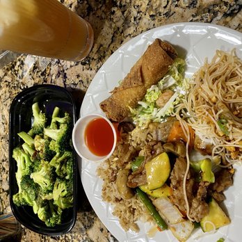 Let's Eat - a plate of food on a table - Asian Fusion Near Me - Naples, Florida