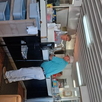 AJ's Diner - a man and a woman standing in a kitchen - American Near Me - Crossville, Tennessee AJ's Diner - a man and a woman standing in a kitchen - American Near Me - Crossville, Tennessee