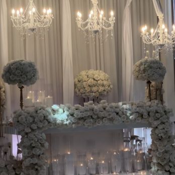 Nora's Designed Flowers - Head table cascading flowers and beautiful centerpieces - Florists Near Me - North Hollywood, California Nora's Designed Flowers - Head table cascading flowers and beautiful centerpieces - Florists Near Me - North Hollywood, California