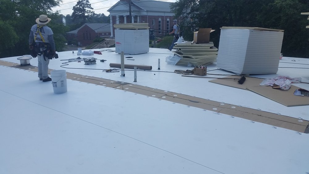 Slide of Total Quality Roofing