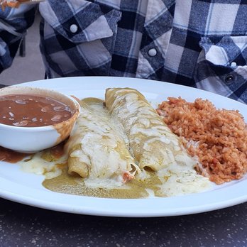 Uncle Julio's - Cheese enchiladas with rice and brown beans - Tex-Mex Near Me - Columbia, Maryland Uncle Julio's - Cheese enchiladas with rice and brown beans - Tex-Mex Near Me - Columbia, Maryland