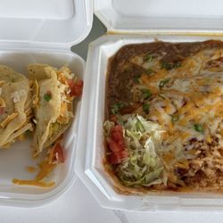 El Volcan Mexican Grill & Cantina - Pork Burrito with beans and rice, 3 Beef Tacos