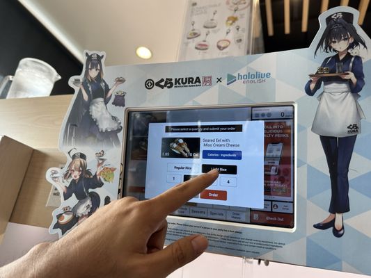 Kura Revolving Sushi Bar by null