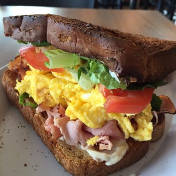 Root 31 - Egg sandwich on multigrain bread with ham, cheese, lettuce, tomato and mayo. - Cafes Near Me - Rochester, New York Root 31 - Egg sandwich on multigrain bread with ham, cheese, lettuce, tomato and mayo. - Cafes Near Me - Rochester, New York