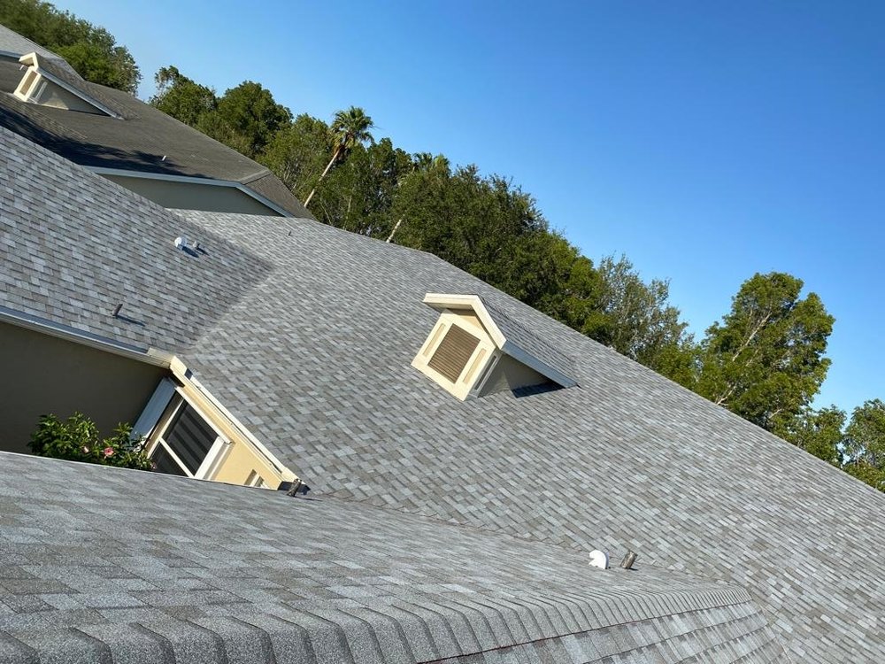 Slide of D’ Roofing Group