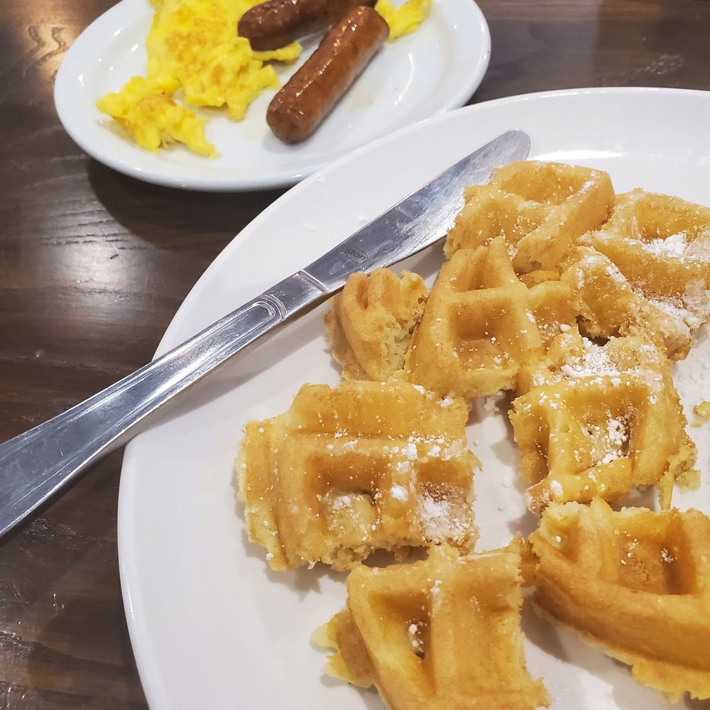Another Broken Egg Cafe - Waffle with side of eggs and chicken maple sausage - American Near Me - Williamsburg, Virginia Another Broken Egg Cafe - Waffle with side of eggs and chicken maple sausage - American Near Me - Williamsburg, Virginia