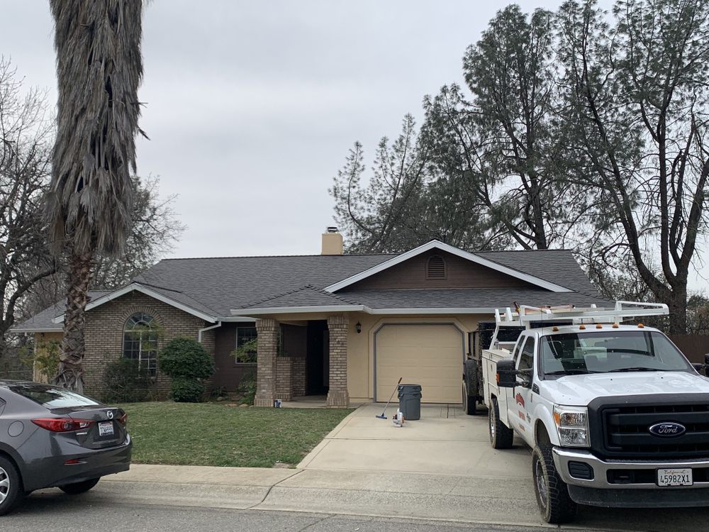 Slide of ZeZee Roofing