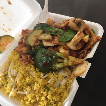 New Happy Wok - a take out box of food - Chinese Near Me - Cedarhurst, New York