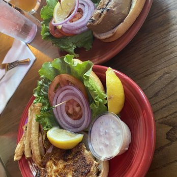 Howard's Pub & Raw Bar Restaurant - Teriyaki Tuna Sandwich and Blackened Tuna Sandwich with a side of fries - Seafood Near Me - Ocracoke, North Carolina Howard's Pub & Raw Bar Restaurant - Teriyaki Tuna Sandwich and Blackened Tuna Sandwich with a side of fries - Seafood Near Me - Ocracoke, North Carolina