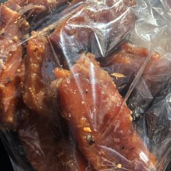 Mad Dog Crabs Seafood Market - Garlic Candied Peppered Salmon Crack!