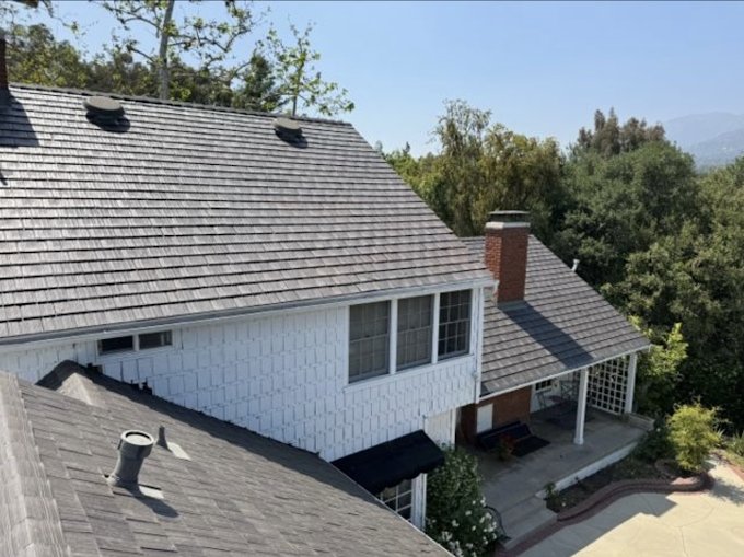 Slide of Galla-Rini Roofing