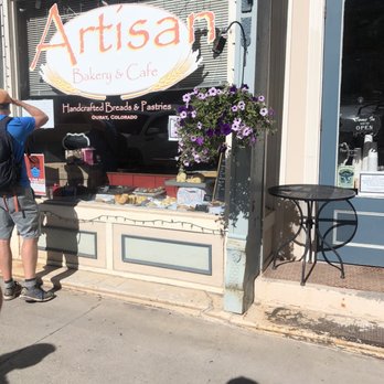 Artisan Bakery & Cafe - Sidewalk view of bakery - for COVID19, you cannot go in and you have to wear a mask to order at the door. Also, credit card is recommended. - Bakeries Near Me - Ouray, Colorado Artisan Bakery & Cafe - Sidewalk view of bakery - for COVID19, you cannot go in and you have to wear a mask to order at the door. Also, credit card is recommended. - Bakeries Near Me - Ouray, Colorado