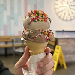 Gelati Celesti - Small Rainbow Cookie and Cookies & Cream Ice Cream in a Cake Cone with Rainbow Sprinkles