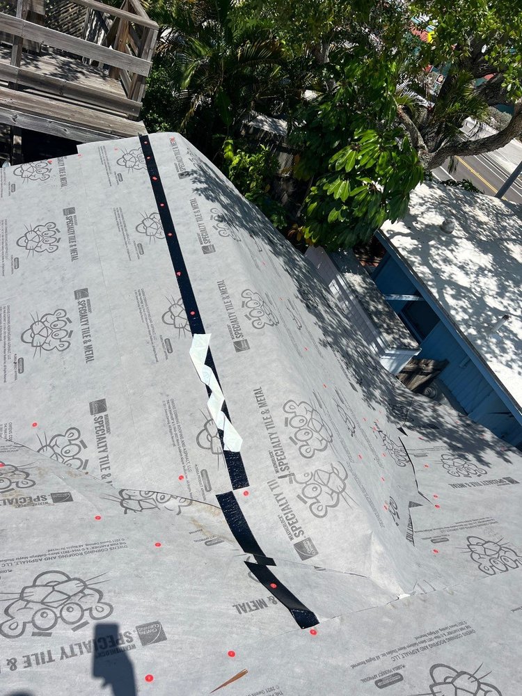 Slide of Chappelle Roofing