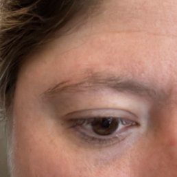Note the lack of any clean up/shaping and to make matters worse the area she pulled hair out of in the middle of my brow