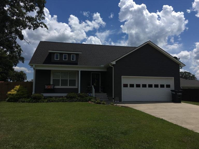 Slide of Tycon Roofing