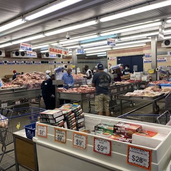 Peoria Packing Butcher Shop - customers in a grocery store - Meat Shops Near Me - Chicago, Illinois Peoria Packing Butcher Shop - customers in a grocery store - Meat Shops Near Me - Chicago, Illinois