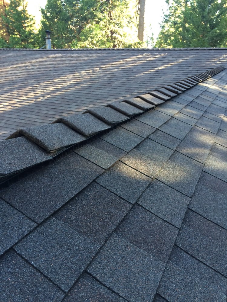 Slide of Kelly Roofing