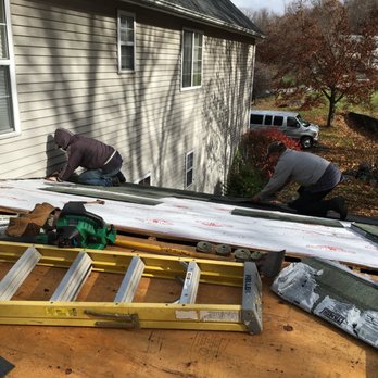 Chester Contracting - two men working on the roof of a house - General Contractors Near Me - Pawling, New York Chester Contracting - two men working on the roof of a house - General Contractors Near Me - Pawling, New York