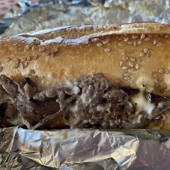 Cheesesteak Louies - Classic Cheesesteak w/ onions on sesame roll. Coopers sharp cheese. - Cheesesteaks Near Me - Seaside Heights, New Jersey Cheesesteak Louies - Classic Cheesesteak w/ onions on sesame roll. Coopers sharp cheese. - Cheesesteaks Near Me - Seaside Heights, New Jersey
