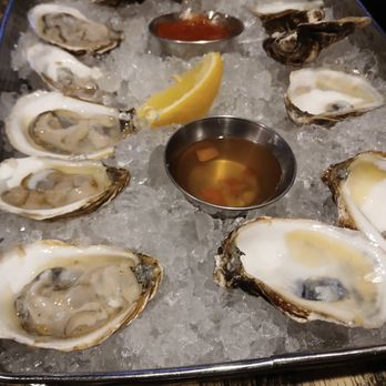 Fork & Fire - Oysters on Ice - Buck a Shuck ($1 each!) - New American Near Me - Farmington, Connecticut Fork & Fire - Oysters on Ice - Buck a Shuck ($1 each!) - New American Near Me - Farmington, Connecticut