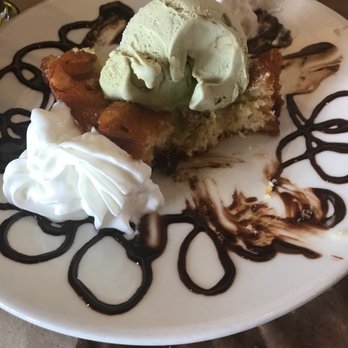 NiDo Caffe - Almond cake with pistachio ice cream. - Italian Near Me - Miami, Florida NiDo Caffe - Almond cake with pistachio ice cream. - Italian Near Me - Miami, Florida
